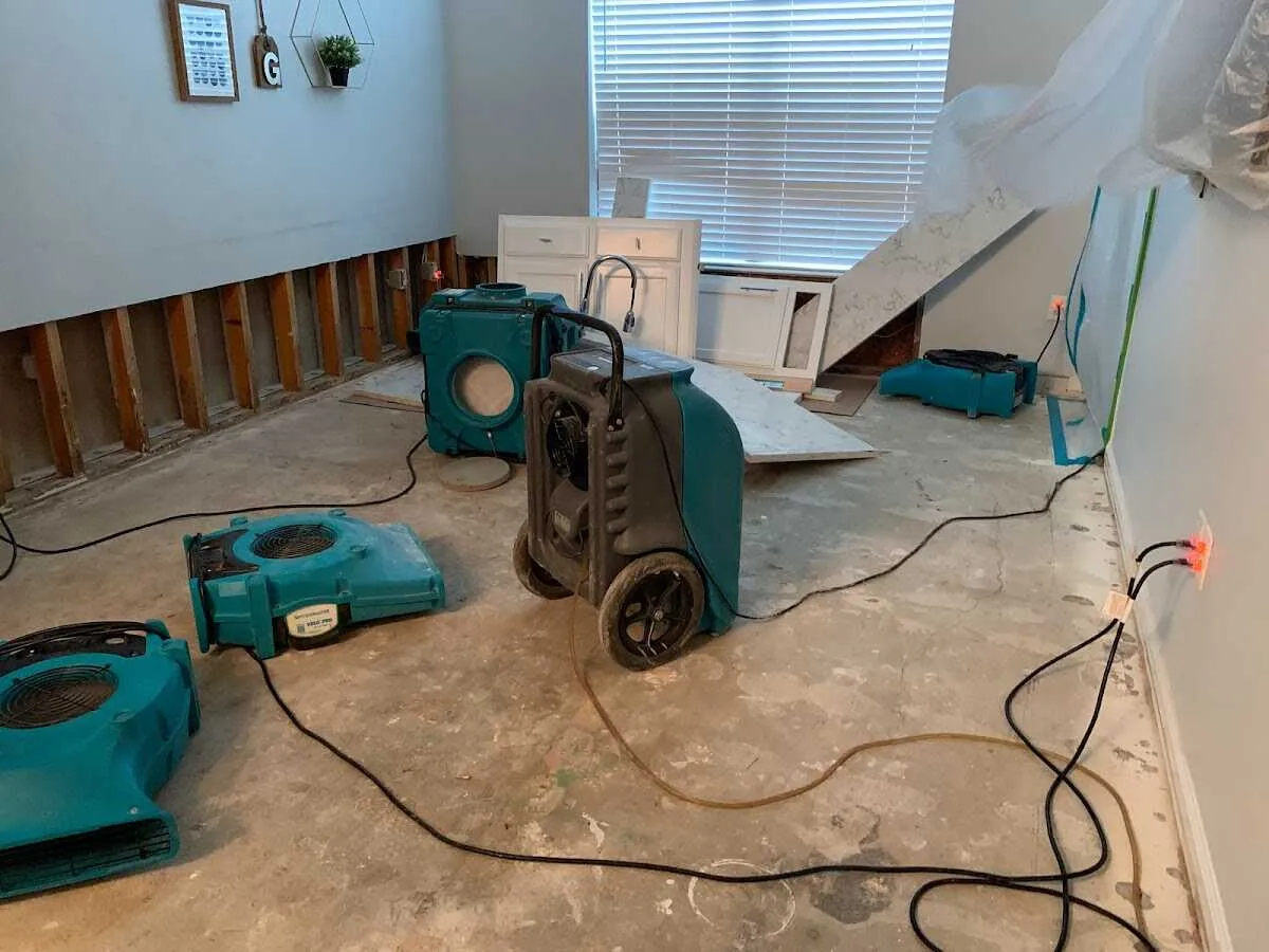 Dehumidifier in flood-cut room for Water Damage Restoration in Kahului